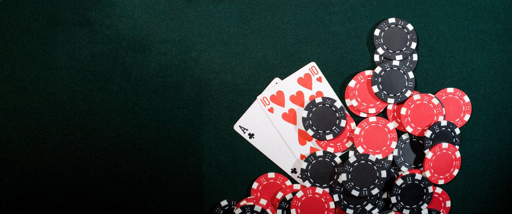 Casino chips and texas holdem poker cards.
